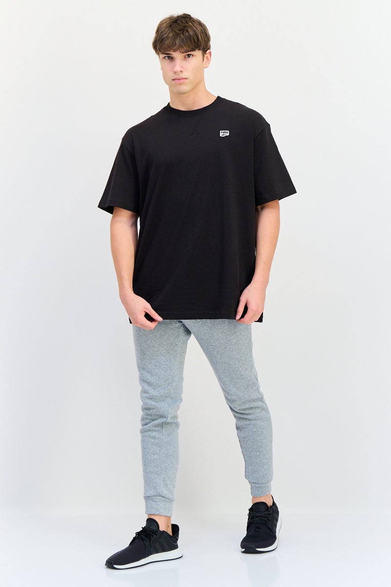 PUMA Men Relaxed Fit Short Sleeve Downtown Badge Outdoor T-Shirt, Black - Image 2